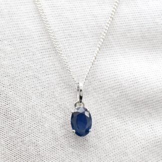 Oval Cut Solitaire Pendant With 7x5mm Blue Sapphire Prong Set In 14k White Gold Necklaces