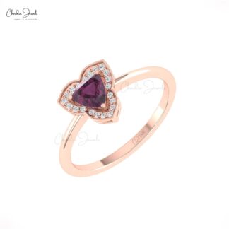 Solid gold garnet halo statement ring