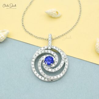 Swirl Diamond Halo Pendant With 6mm Tanzanite Prong Set In 14k White Gold Spiral Pendants