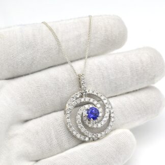 Swirl Diamond Halo Pendant With 6mm Tanzanite Prong Set In 14k White Gold Spiral Pendants